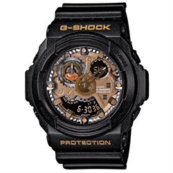 Image of Casio sort / guld G-shock ur